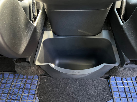 Storage box for the rear row of seats